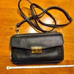 Tumi Black Crossbody Bag with Gold Hardware